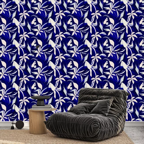 Behang Bloemmotief met blauwe bloemen