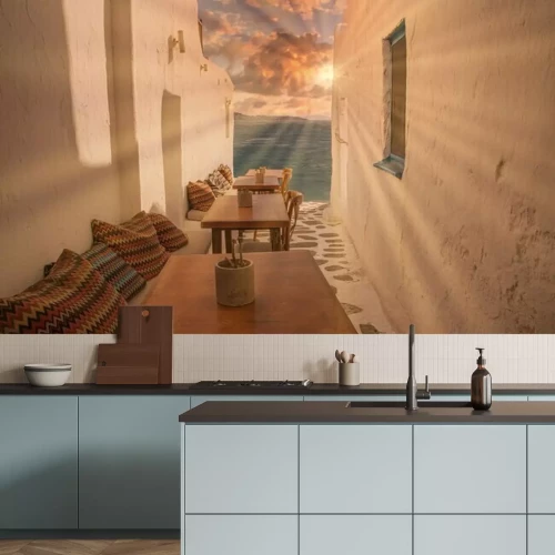 Fotobehang Benches with pillows in a typical Greek bar in Mykonos town with sea view, Cyclades islands, Greece. Travel concept.