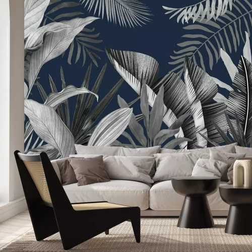 Fotobehang Tropische bladeren op marineblauwe achtergrond in grunge-stijl