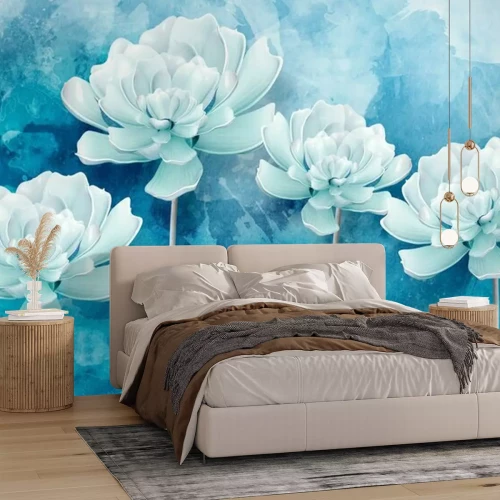 Fotobehang Vier blauwe bloemen op een blauwe achtergrond