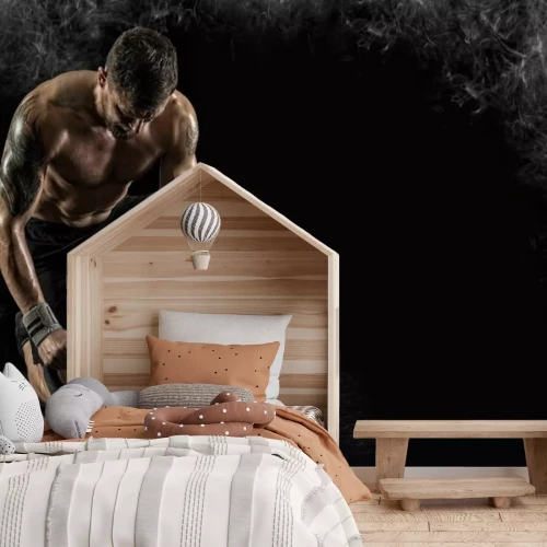 Fotobehang Atleet traint met een kettlebell