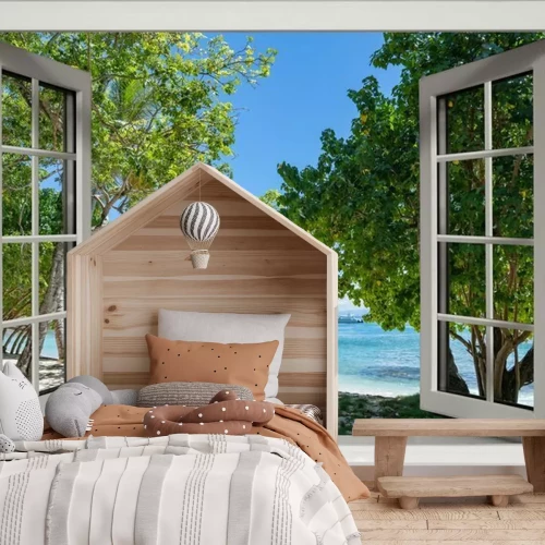 Fotobehang Raam met uitzicht op een tropisch strand en de zee