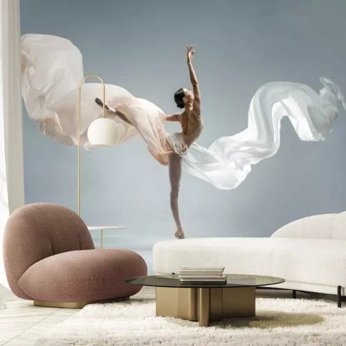 Fotobehang Dansende ballerina op een grijze achtergrond