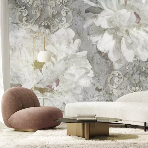 Fotobehang Bloemenornament op een betonnen achtergrond