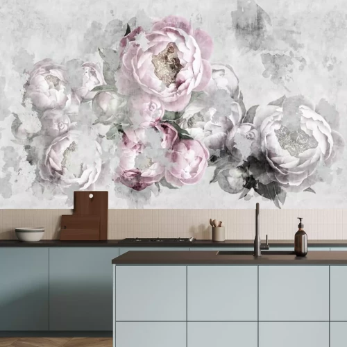 Fotobehang Roze en grijze pioenrozen op een betonnen achtergrond