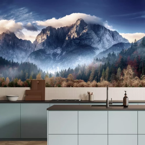 Fotobehang Bomen in herfstkleuren tegen een berglandschap