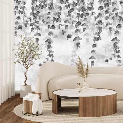 Fotobehang Tropische bladeren op een betonnen muur