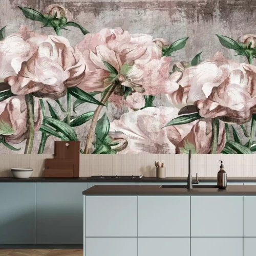 Fotobehang Pioenroosroze bloemen en groene bladeren op beton