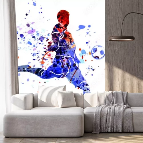 Sticker Een voetballer schiet tijdens een wedstrijd uit een volley