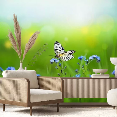 Sticker Blauwe bloemen en een vlinder