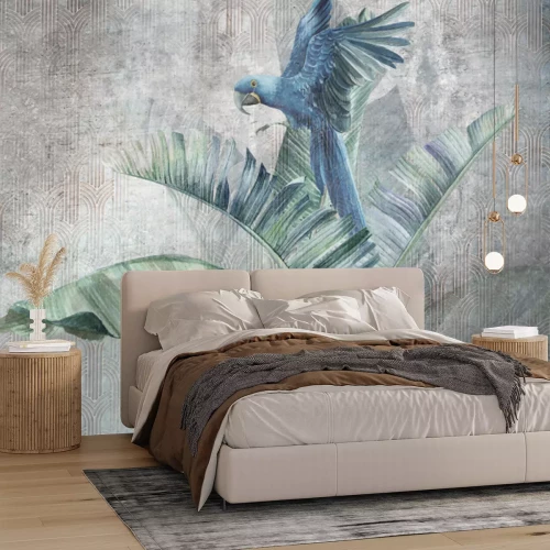 Fotobehang Een papegaai op grote bananenbladeren