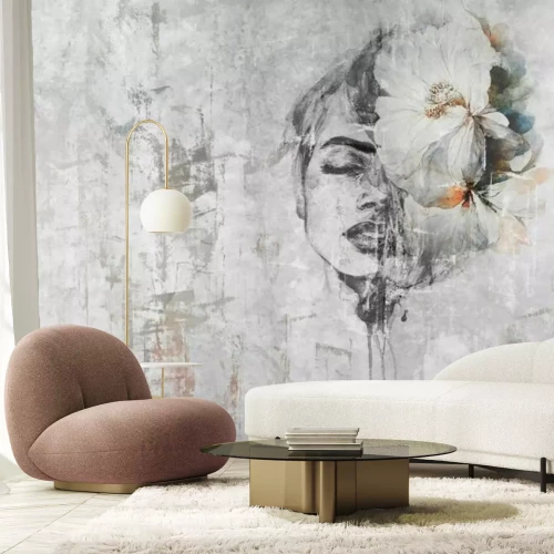 Fotobehang Portret van een vrouw met een bloem op beton