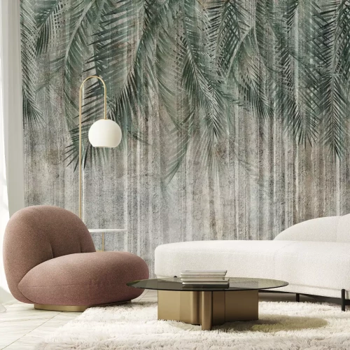 Fotobehang Tropische palmbladeren op beton