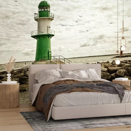 Fotobehang Groen-witte vuurtoren op de golfbreker