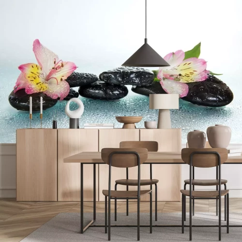 Sticker Stenen en alstroemeria bloem in het water daalt