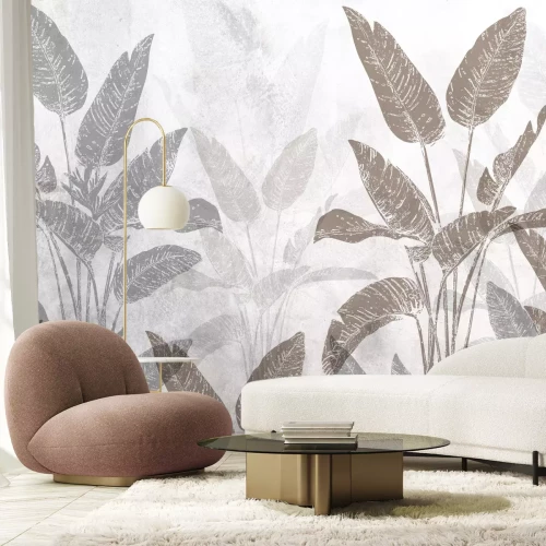 Fotobehang Strelitzia grote tropische planten op een betonnen achtergrond