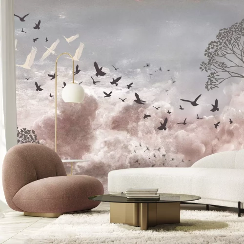 Fotobehang Vogels en paardenbloemzaden tegen een bewolkte lucht