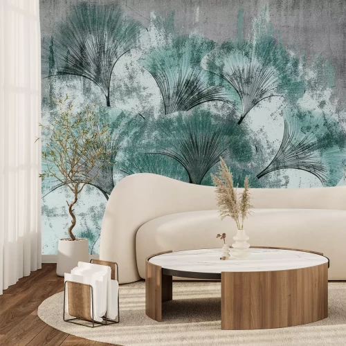 Fotobehang Ginkgobladeren op een betonnen achtergrond