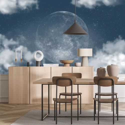 Fotobehang Volle maan tussen de wolken aan de hemel