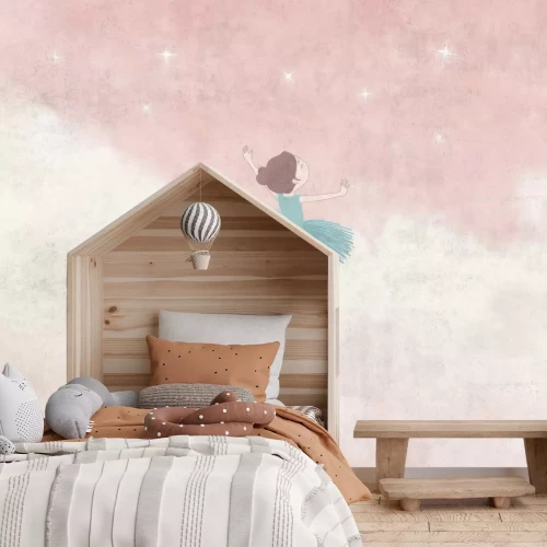 Fotobehang Een ballerina tegen een roze lucht met wolken