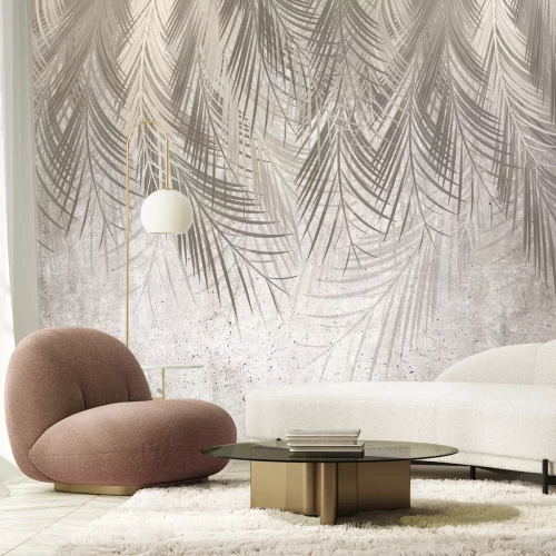 Fotobehang Tropische bladeren hangen van bovenaf op een grijze achtergrond met textuur