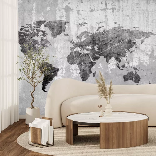Fotobehang Wereldkaart op een betonnen achtergrond