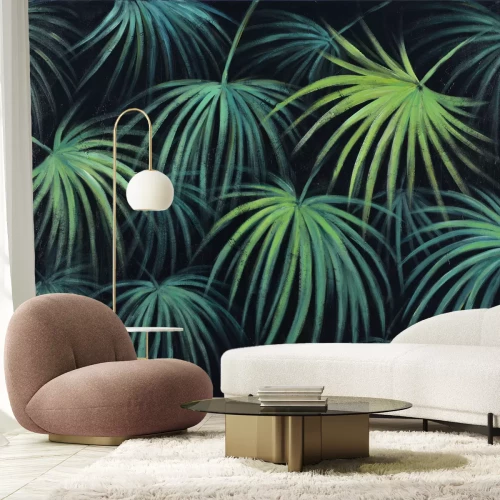 Fotobehang Groene tropische bladeren op een donkere achtergrond