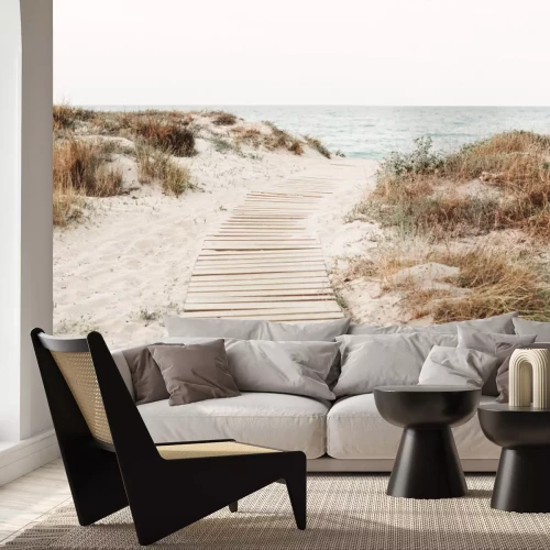 Fotobehang Houten afdaling naar het strand met uitzicht op zee