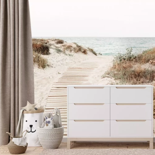 Fotobehang Houten afdaling naar het strand met uitzicht op zee