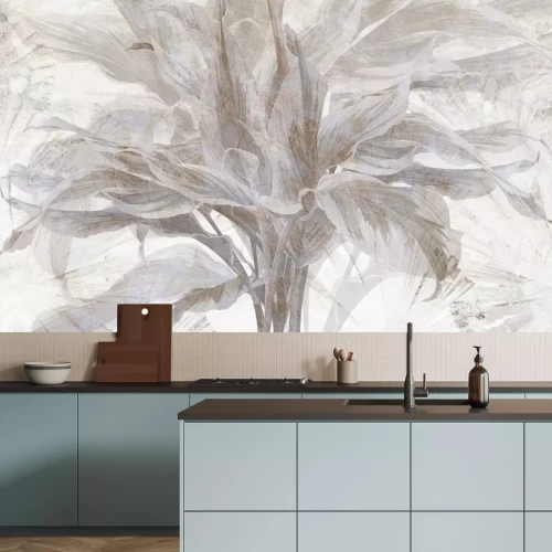 Fotobehang Tropische bladeren op een lichte betonnen achtergrond