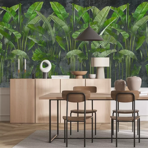 Fotobehang Groene tropische bananenbladeren op een gestructureerde achtergrond