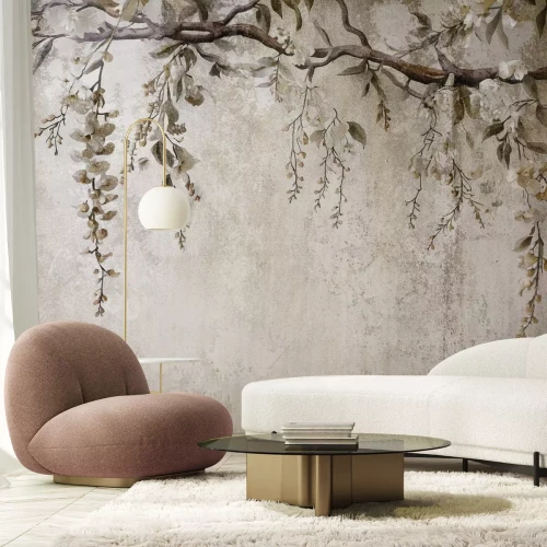 Fotobehang Bloemen op een tak met een betonnen textuur op de achtergrond