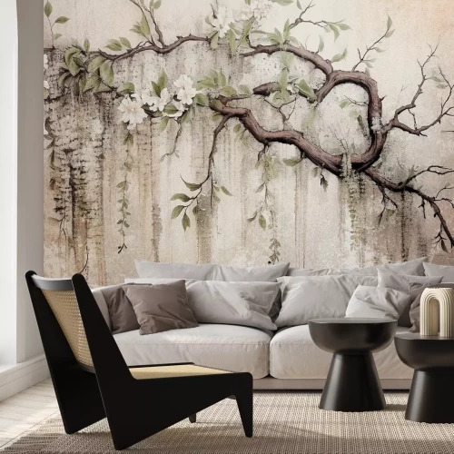 Fotobehang Witte bloemen op een boom met een betonnen textuur op de achtergrond