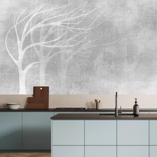 Fotobehang Boomsilhouetten op een betonnen textuur