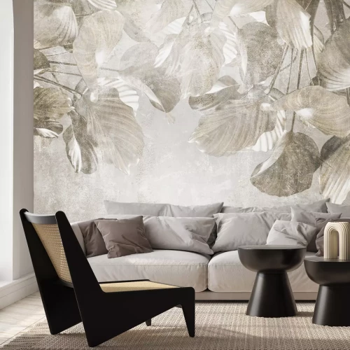 Fotobehang Tropische bladeren op beton in grijstinten