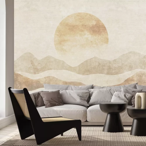 Fotobehang De zon die ondergaat achter een berglandschap