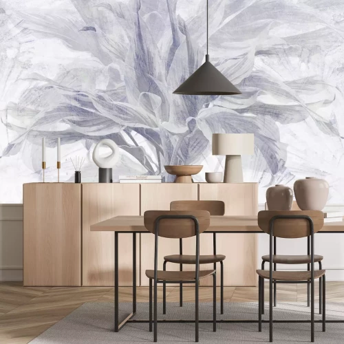 Fotobehang Tropische plantenbladeren op een gestructureerde betonnen achtergrond