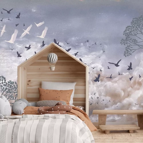 Fotobehang Vogels en paardenbloemzaden tegen de wolken