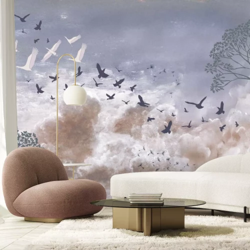 Fotobehang Vogels en paardenbloemzaden tegen de wolken