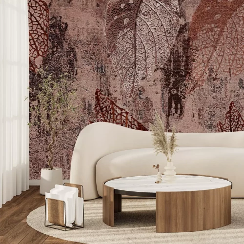 Fotobehang Bladeren op een gestructureerde betonnen achtergrond