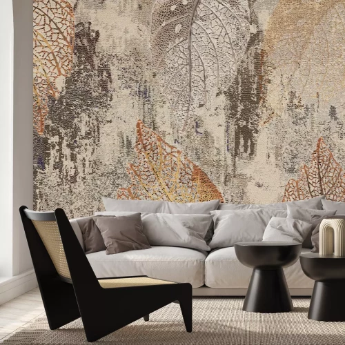 Fotobehang Een muurschildering met bladeren op een betonnen achtergrond