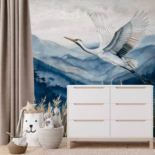 Fotobehang Een reiger tegen een aquarel berglandschap