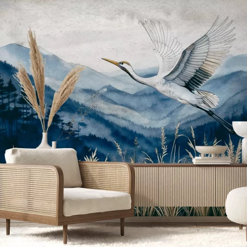 Fotobehang Een reiger tegen een aquarel berglandschap