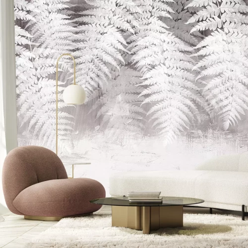 Fotobehang Witte varenbladeren op een betonnen achtergrond