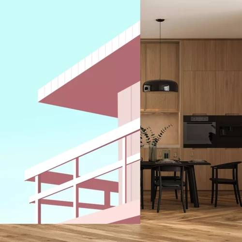 Fotobehang Een roze huis aan zee tegen een blauwe lucht