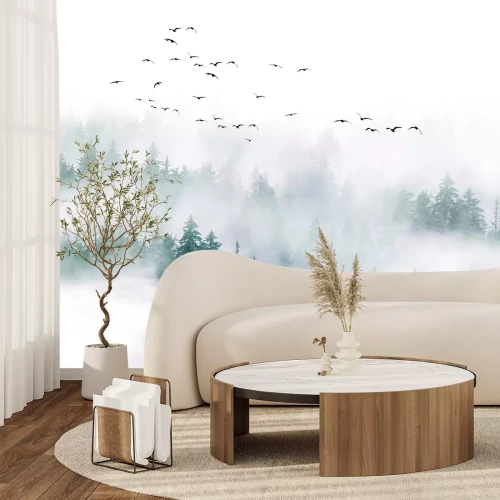 Fotobehang Een mistig bergachtig boslandschap.