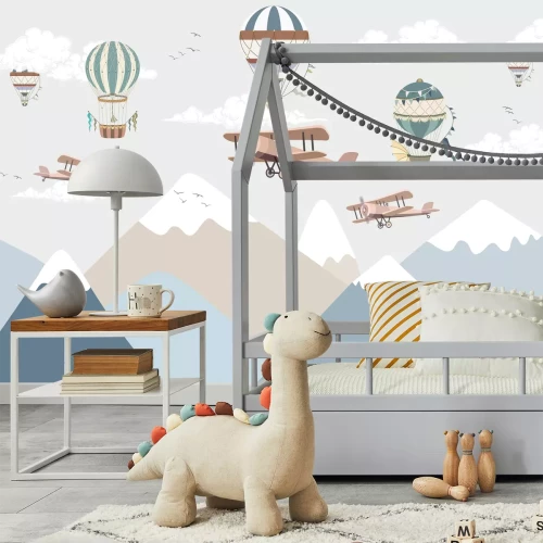 Fotobehang Ballonnen zweven boven een berglandschap, sprookjesmotief