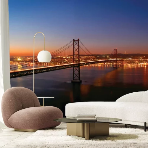 Fotobehang Landschap met een brug bij zonsondergang