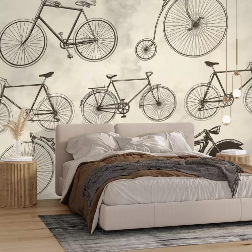 Fotobehang Vintage motorfietsen en retrofietsen op een grijs oppervlak