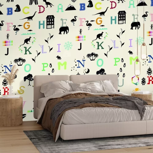 Fotobehang Kleurrijke alfabetletters versierd met natuurmotieven